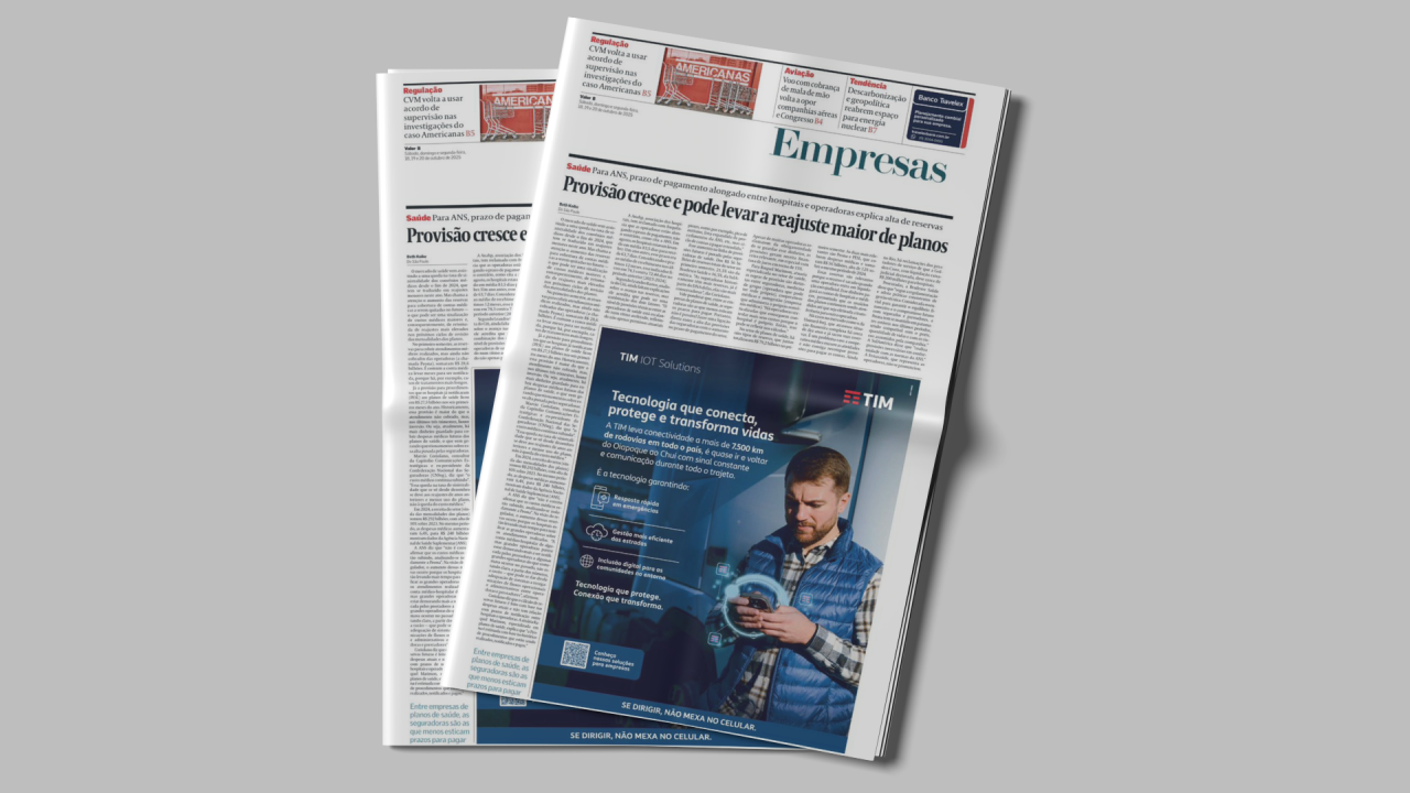  Página de jornal na editoria Empresas com anúncio da TIM IoT Solutions com mensagem de segurança no trânsito alertando motoristas a não usar o celular ao dirigi